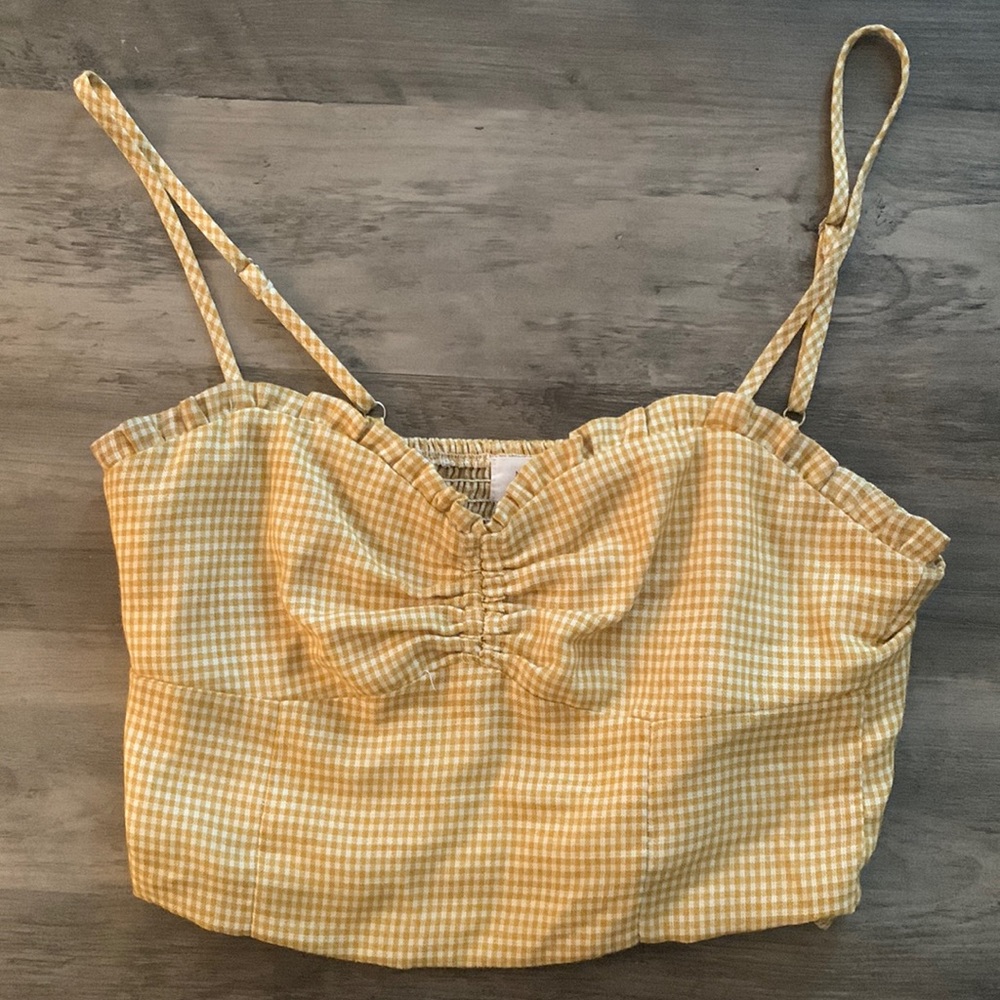 Women’s size medium, crop gold and  white top